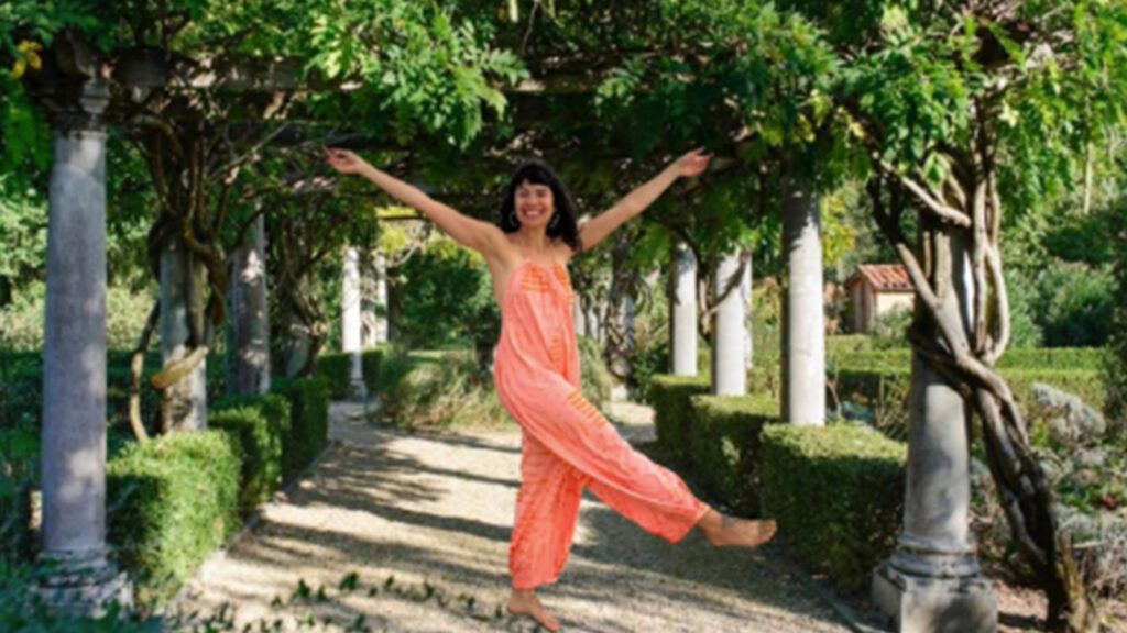 Clara Roberts standing at yoga retreat